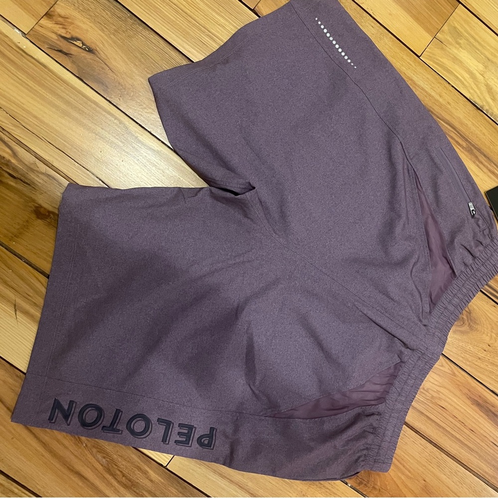 Men’s Peloton (Solfire) Shorts NWT. Purple in Size Medium.